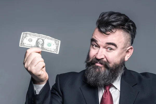 Hombre Barbudo Adulto Traje Que Sostiene Dólar Sobre Fondo Gris — Foto de Stock