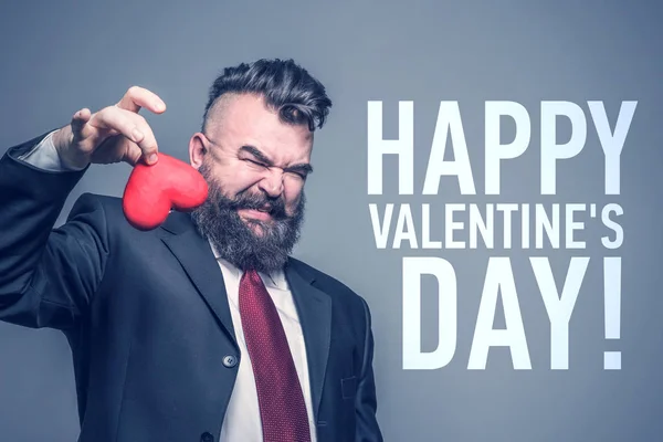 Adult Bearded Man Black Suit Disgust Holding Red Heart Gray — Stock Photo, Image