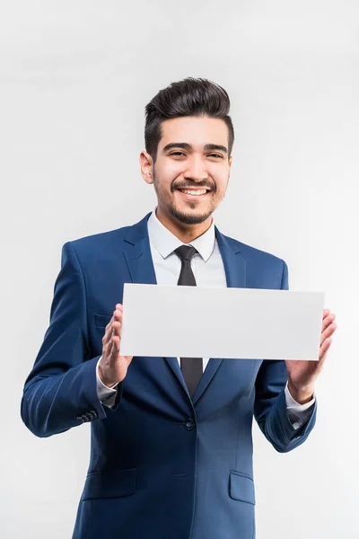 Young Attractive Man Blue Suit Holding White Sign White Background — Stock Photo, Image