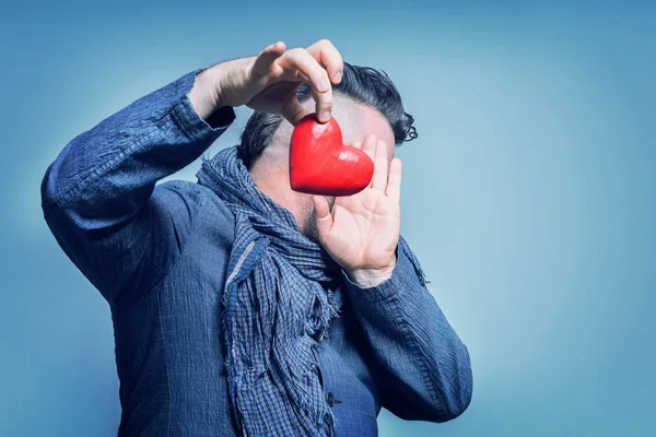 Adult Bearded Man Blue Jacket Scarf Turns Away Red Heart — Stock Photo, Image