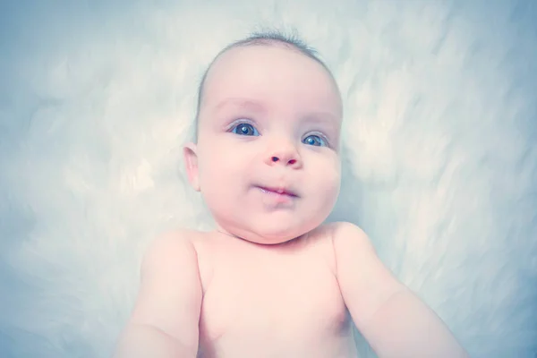 Cute Baby Lying White Fur Toned — Stock Photo, Image