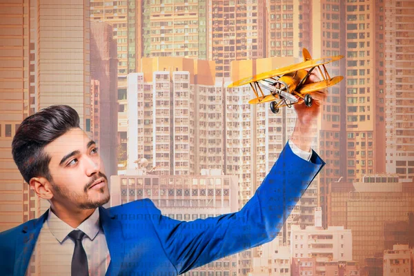 Young Attractive Man Blue Suit Holding Yellow Airplane Model Background — Stock Photo, Image