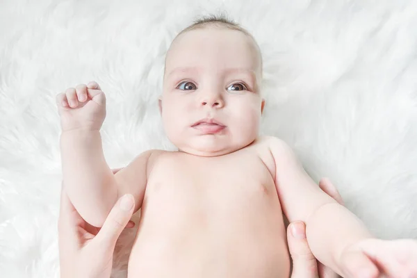 Cute Baby Lies White Fluffy Background — Stock Photo, Image