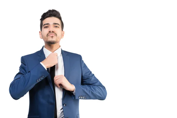 Young Attractive Man Blue Suit Corrects Tie White Background Isolated — Stock Photo, Image