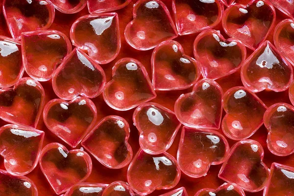 Transparent Glass Hearts Red Leather Background — Stock Photo, Image