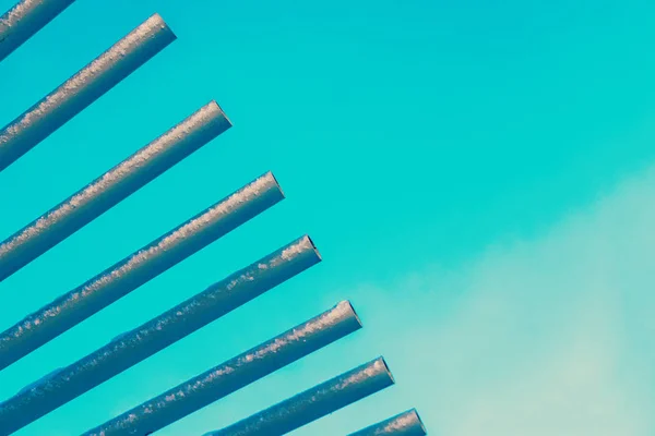 Row Metal Pipes Sky Toned — Stock Photo, Image