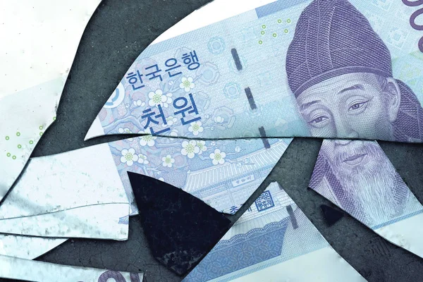 Banconota coreana il taglio di Vittoria su parti . — Foto Stock
