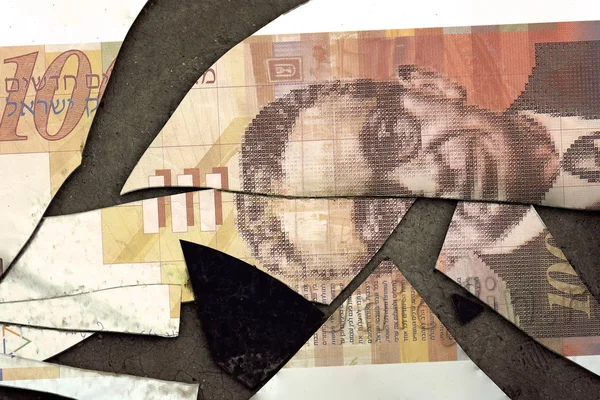 La banconota Shekel è tagliata su parti . — Foto Stock