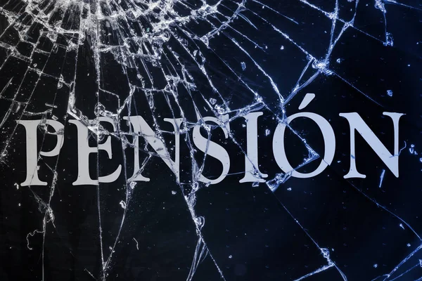 The Spanish text "Pension" on the broken glass. — Stock Photo, Image