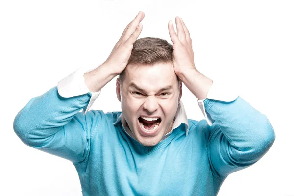 Screaming man heeft een hoofdpijn. — Stockfoto
