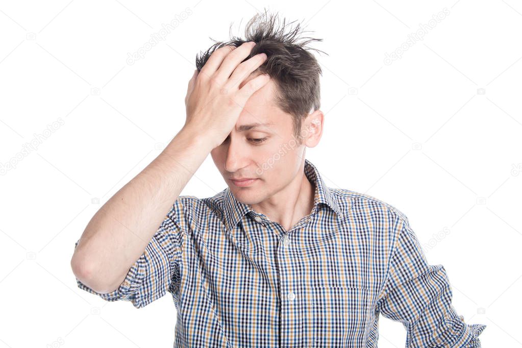 Thinking man with hand on forehead over white background. Isolat