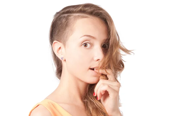 Cute girl with a fashionable haircut on a white background in th — Stock Photo, Image