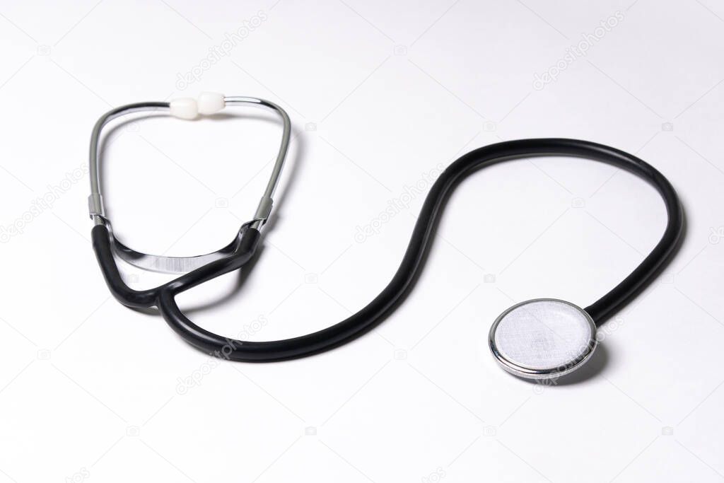 Black stethoscope isolated on white background