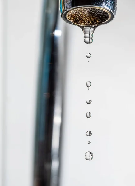 A poorly closed tap leaks water