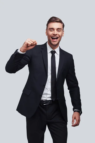 Good Looking Young Man Suit Gesturing Victory Smiling While Standing — Stock Photo, Image