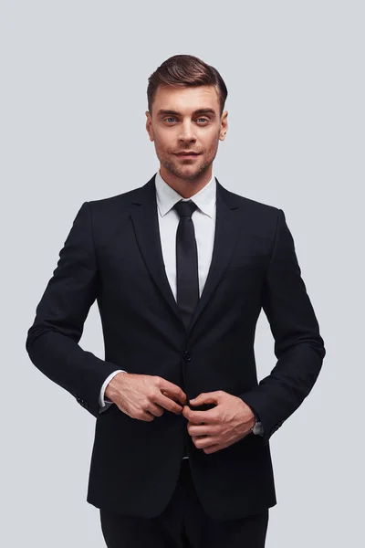Handsome Young Man Full Suit Adjusting His Jacket Studio — Stock Photo, Image