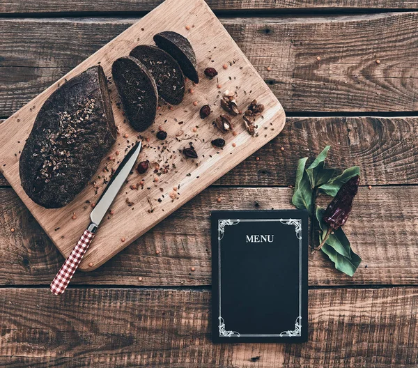 Dark Baked Bread Closed Menu Lying Rustic Table — Stock Photo, Image