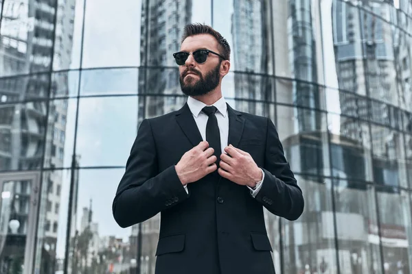 Businessman Suit Sunglasses Adjusting Suit Jacket — Stock Photo, Image