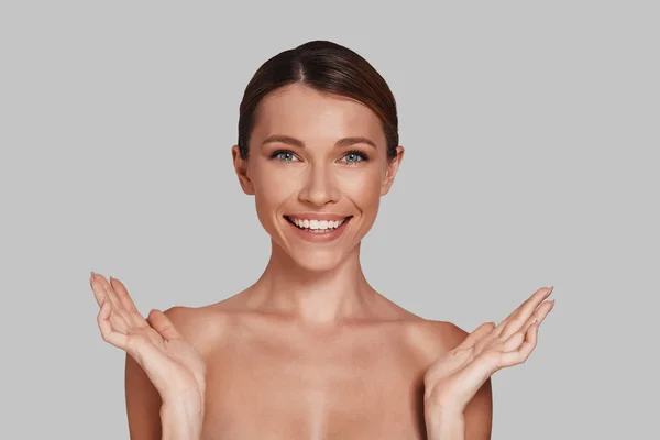 Sensitive Smiling Young Woman Perfect Skin Posing Studio Gesturing Hands — Stock Photo, Image