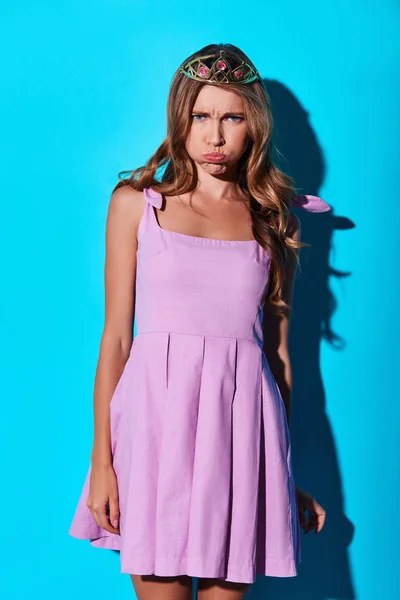 Bored Young Woman Tiara Looking Camera Making Face While Standing — Stock Photo, Image