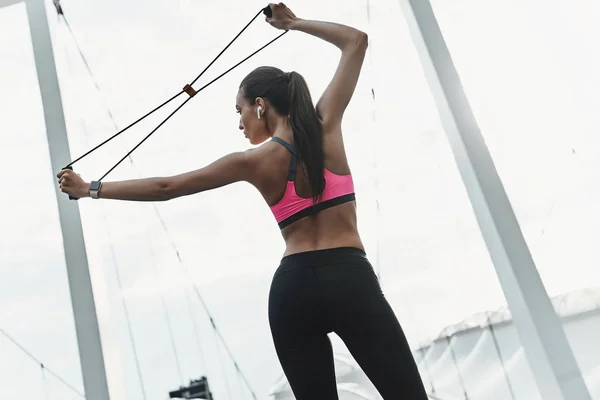 Rear View Woman Sports Clothing Exercising Resistance Band Strength Training — Stock Photo, Image