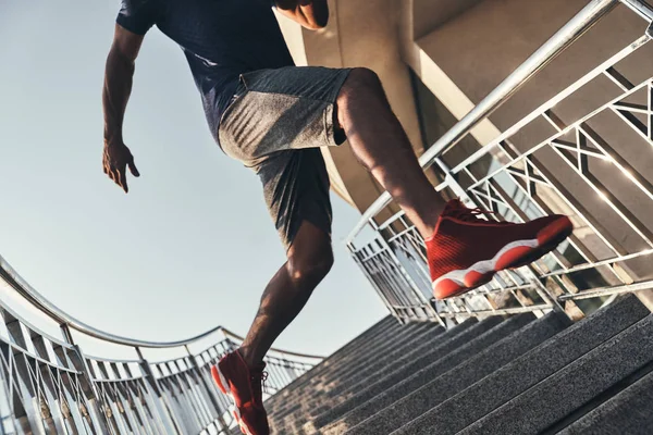 Man Sports Clothing Running Stairs While Exercising Outdoors Low Angle — Stock Photo, Image