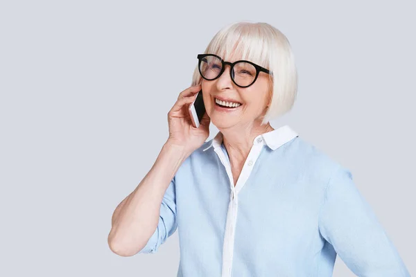 Happy Senior Caucasian Woman Talking Mobile Phone Studio — Stock Photo, Image