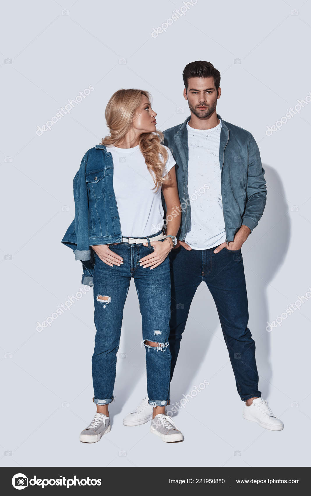 Fashionable Couple Denim Wear Standing Studio Posing Stock Photo