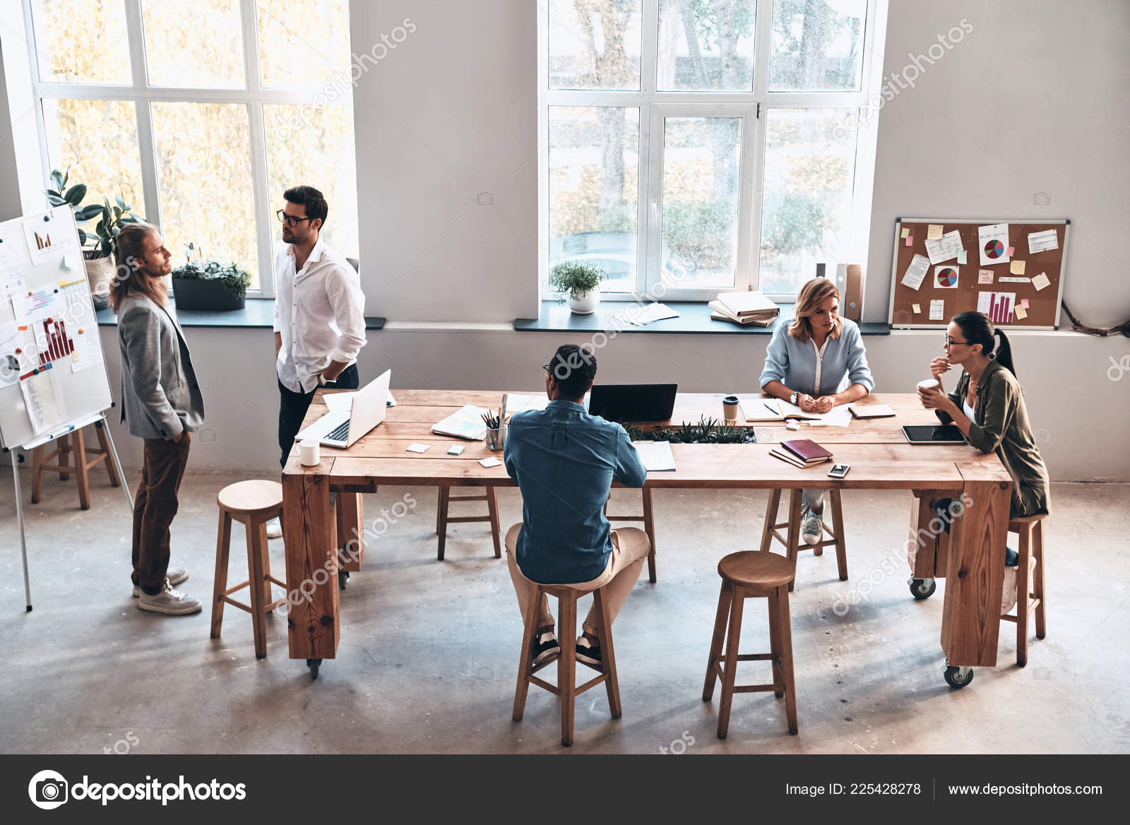 Creative Business People Brainstorming Modern Office Meeting Discussing  Concept Stock Photo by ©gstockstudio 225428278