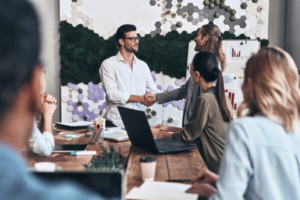 business people shaking hands