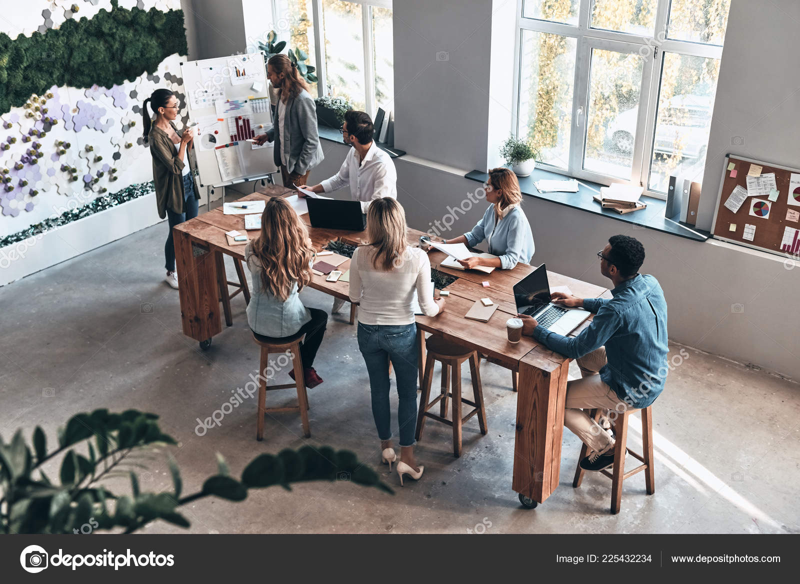 Top View Business People Brainstorming Project Modern Office Table Laptops  Stock Photo by ©gstockstudio 225432234