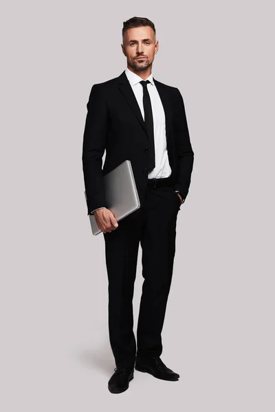 Full Length Business Man Holding Laptop Standing White Background — Stock Photo, Image
