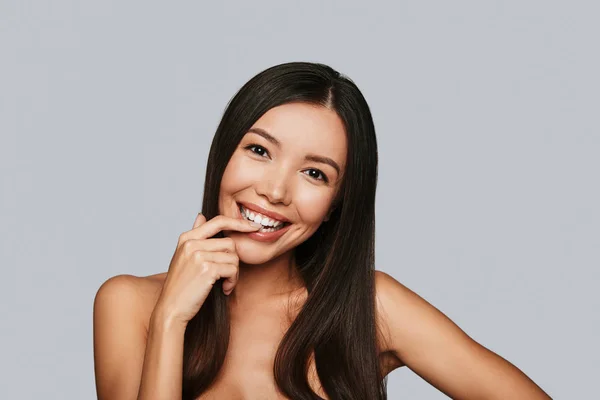 Sensual Young Asian Woman Looking Camera Smiling While Standing Grey — Stock Photo, Image