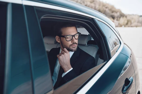 Thinking Thoughtful Young Businessman Keeping Hand Chin While Sitting Car — Stock Photo, Image