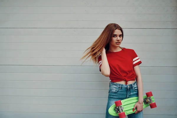 Young Carefree Beautiful Young Woman Looking Camera Carrying Skateboard While — Stock Photo, Image