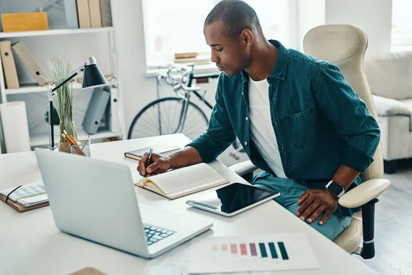 Full Concentration Thoughtful Young African Man Shirt Writing Something While — Stock Photo, Image