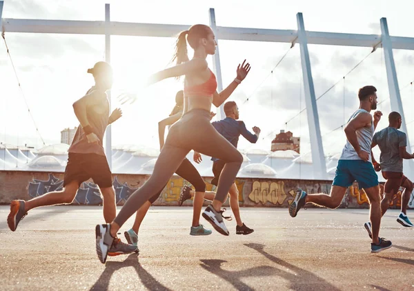 Full Length People Sports Clothing Jogging While Exercising Sidewalk Outdoors — Stock Photo, Image