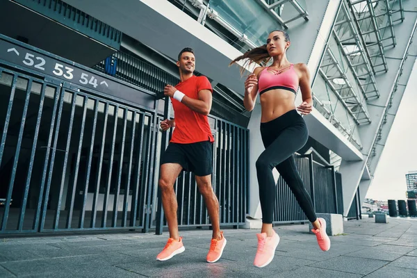 Full Length Two Confident Athletes Sports Clothing Running While Practicing — Stock Photo, Image