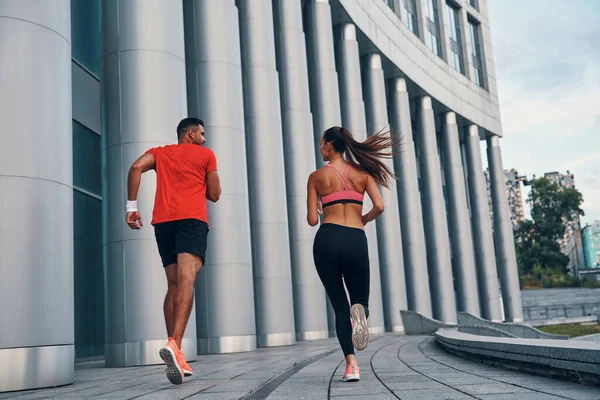 Full Längd Bak Syn Atletiska Par Sportkläder Njuter Morgon Jogging — Stockfoto