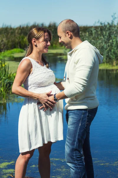 Side Photo Beautiful Pregnant Woman Holding Man Hands Her Belly — Stock Photo, Image