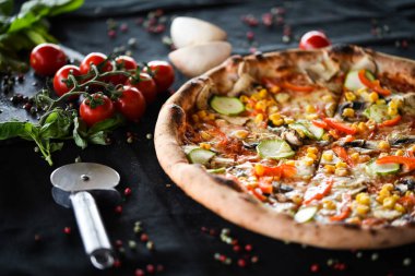 tasty italian vegetarian pizza with fresh vegetables, cheese & tomatoes sauce clipart