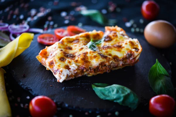 delicious home made lasagna slice - with fresh ingredients after a traditional italian receipt