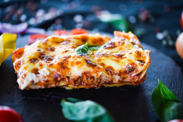 delicious home made lasagna slice - with fresh ingredients after a traditional italian receipt