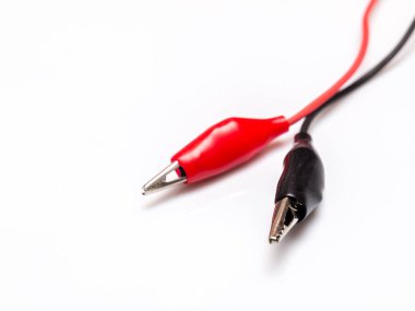 crocodile clips red and black isolated in white background