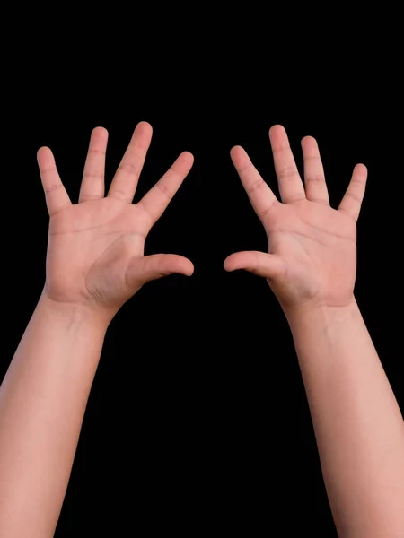 Hands up of boy isolated on black background — ストック写真