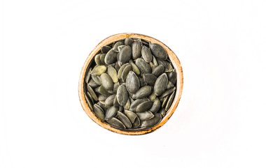 Kabuktaki çiğ kabak çekirdekleri, yemek arkaplanı, üst manzara