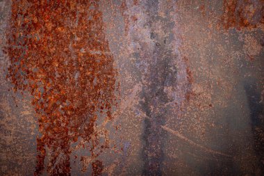 Yüzeyinde aşınma olan paslı demir dokusu.