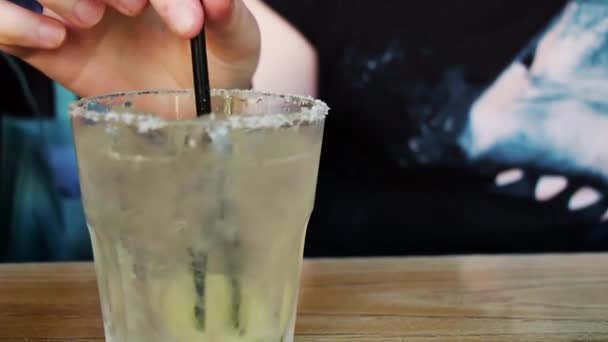 Hand Stirs Margarita Straw — Stock Video