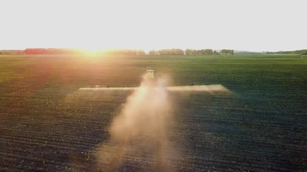Shooting Drone Sprayer Field Sunset Top View Operating Tractor Sprayer — Stock Video