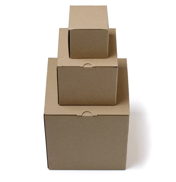 Lepenkové krabice izolované na bílém pozadí — Stock fotografie